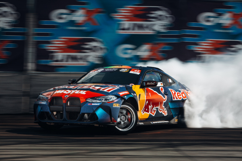 2020 BMW M4 Red Bull car going fast with drift